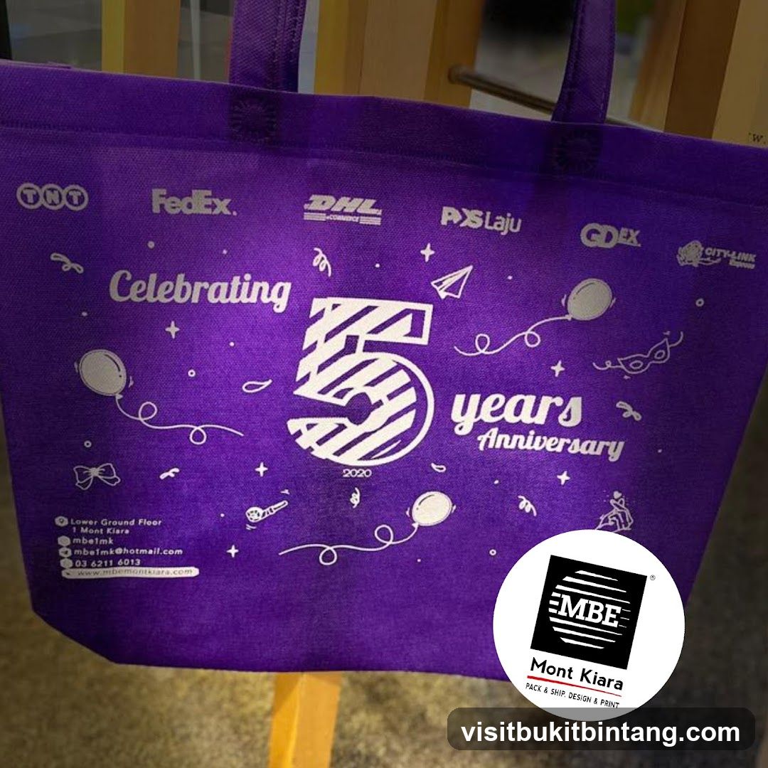 Purple tote bag celebrating 5th anniversary