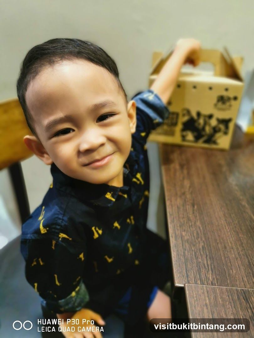 Boy with a takeout box