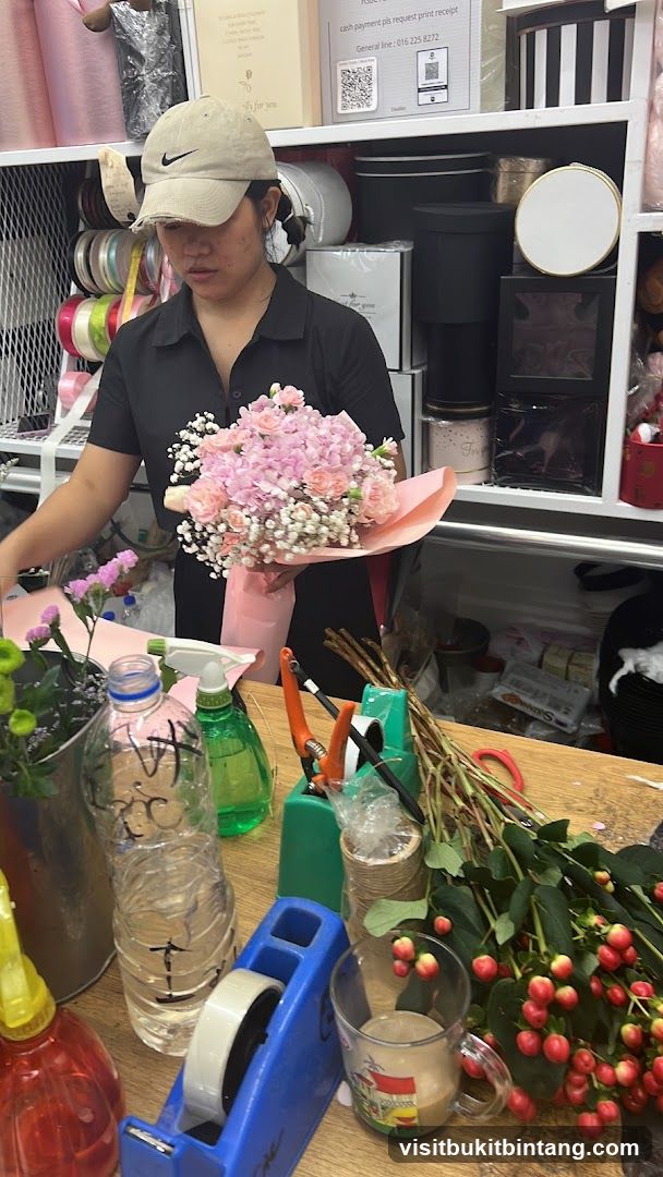 Florist arranging bouquet