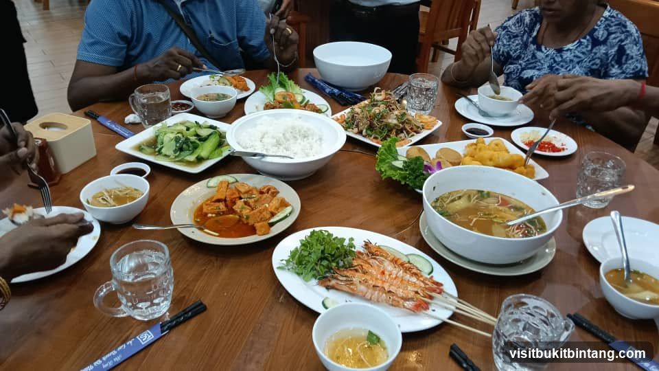 Meal with Grilled Prawns and Various Dishes