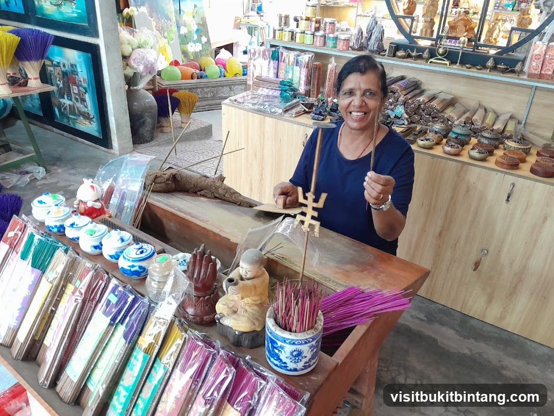 Woman holding incense sticks