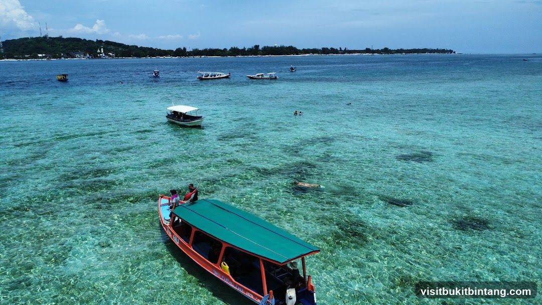 Boats and Snorkelers in Tropical Waters