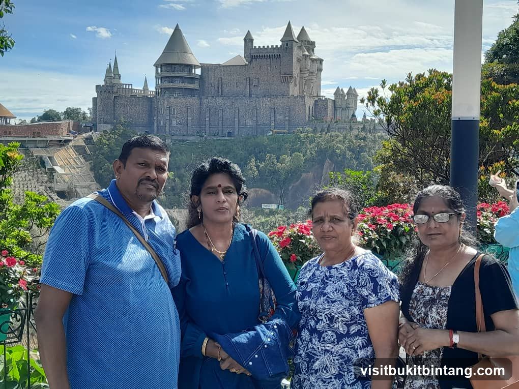 Tourists in front of a castle