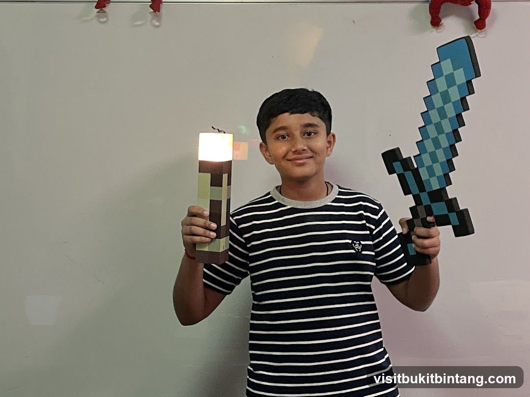 Boy holding Minecraft-themed items