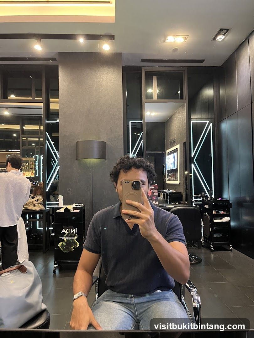 Man taking a selfie in a salon