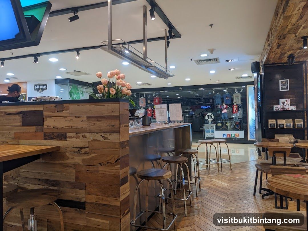 Coffee shop interior with seating and merchandise