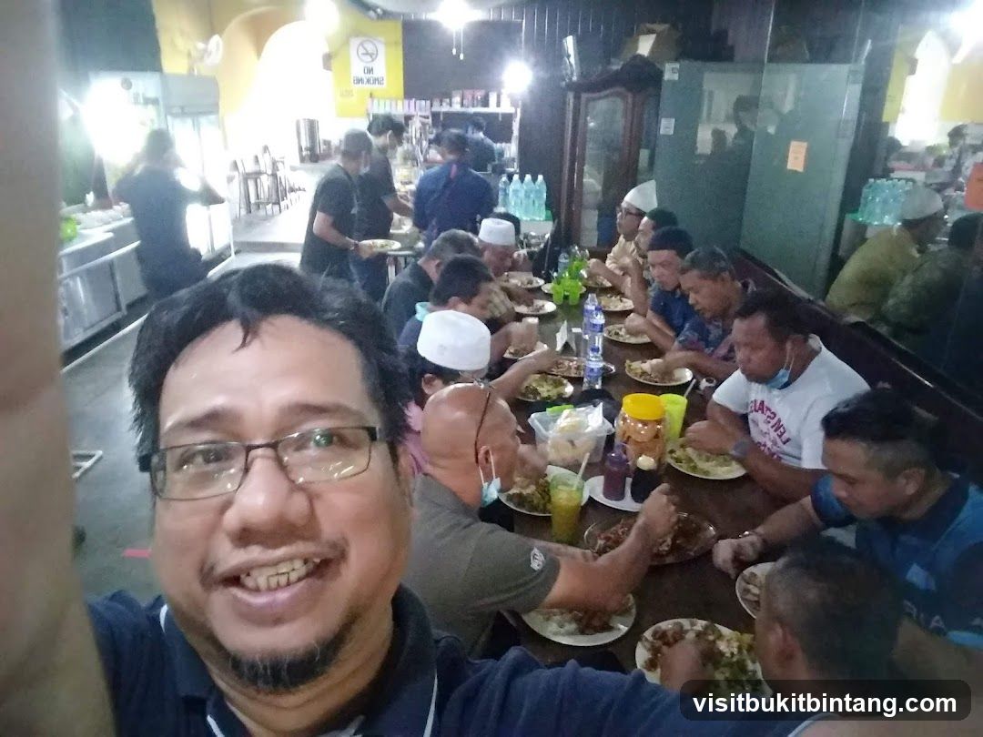 People eating at a long table