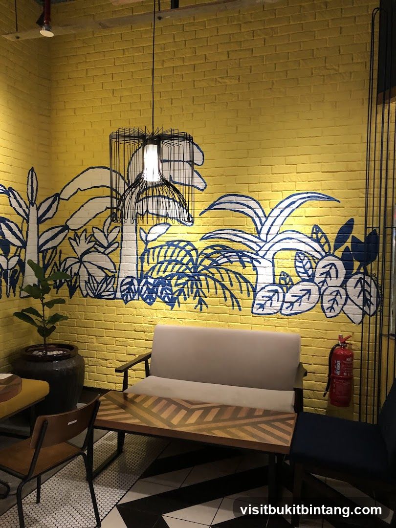 Interior seating area with tropical mural