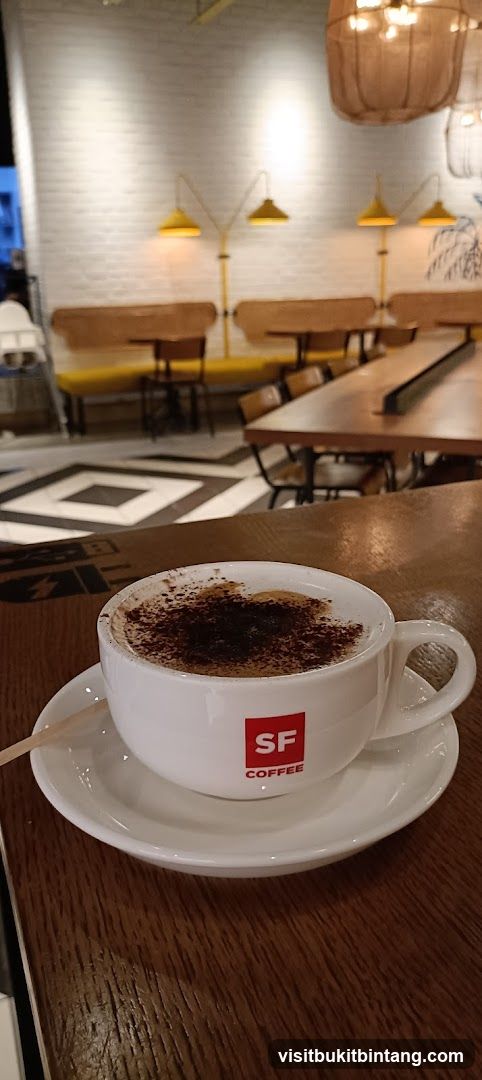 Cappuccino with SF Coffee logo