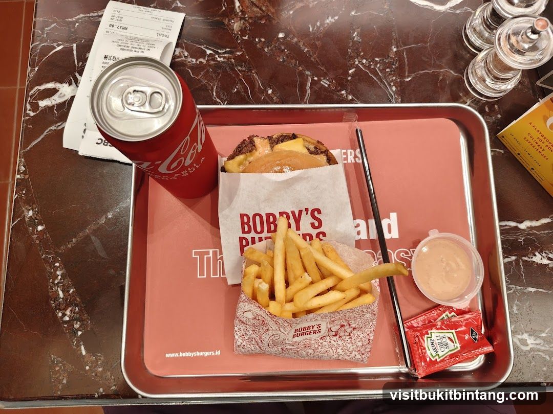 Burger meal with fries and soda