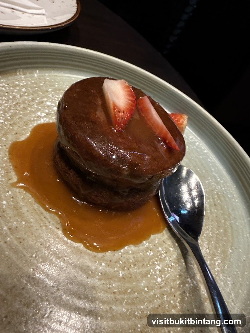 Chocolate Dessert with Strawberries and Caramel Sauce