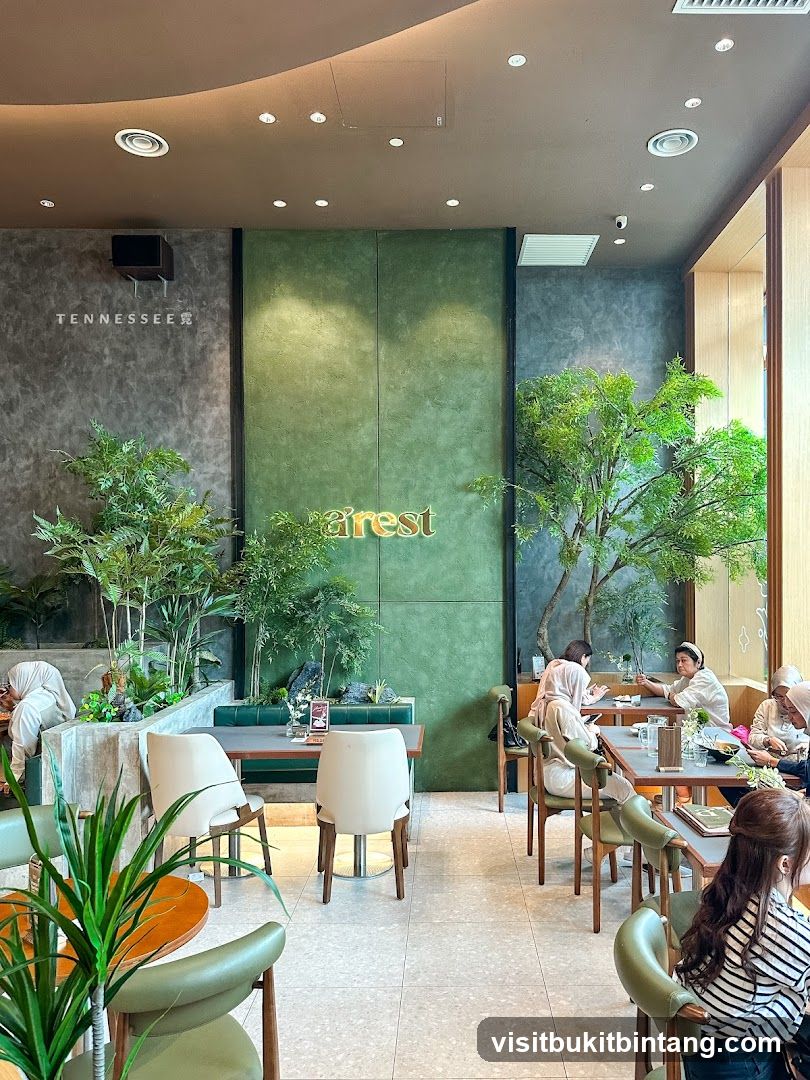 Interior of a cafe with green accents and plants