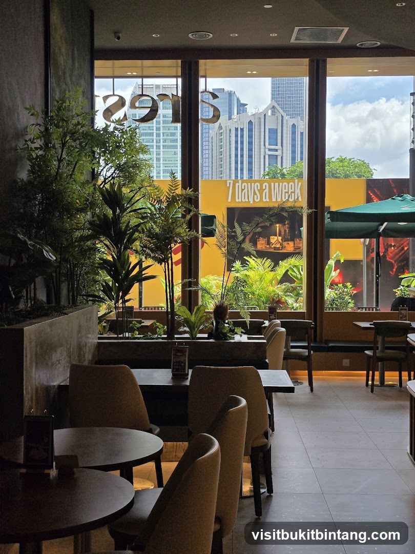 Interior of a cafe with plants and city view