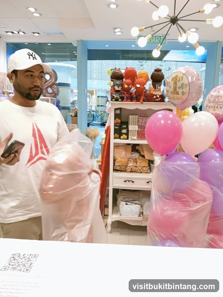 Man holding balloons in a party supply store
