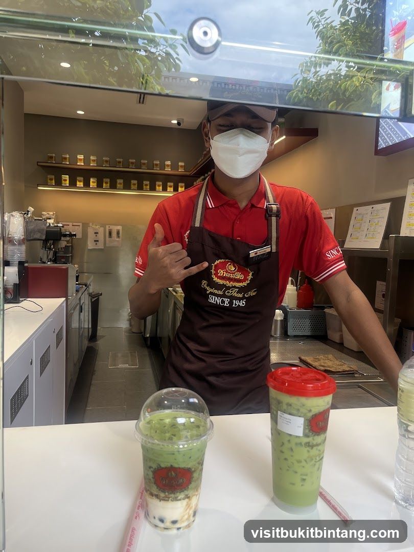 Barista serving drinks