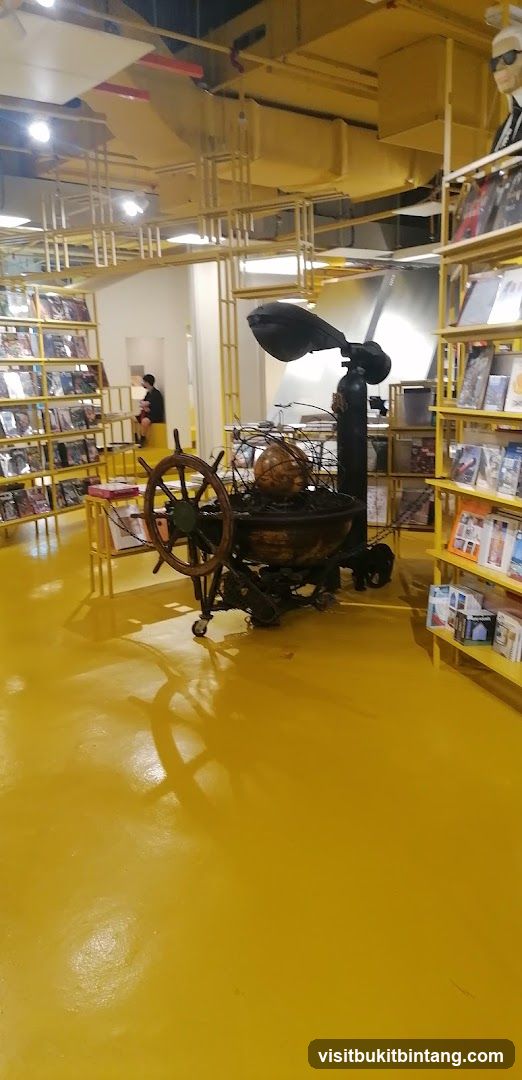 Interior of a bookstore with yellow decor