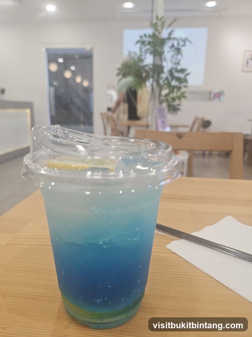 Blue layered drink in cup