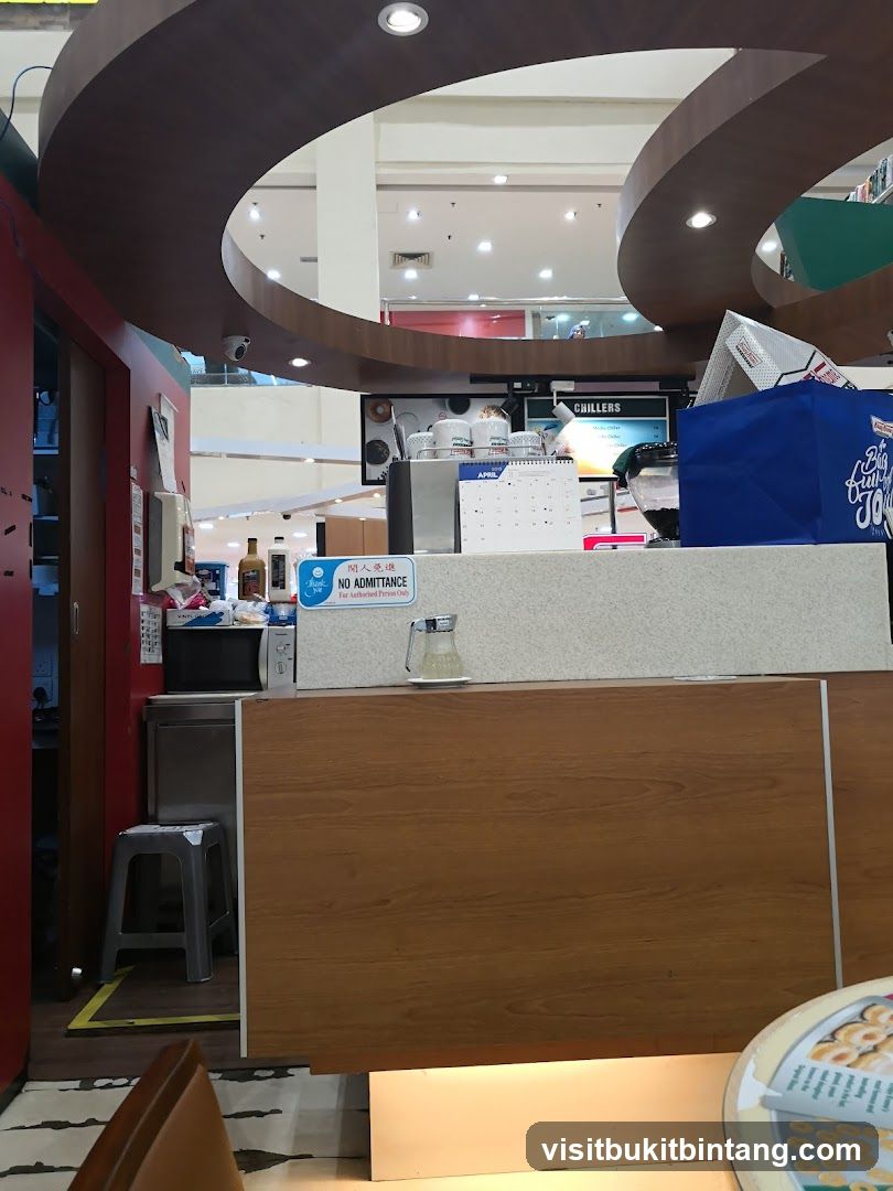 Counter area with menu board and seating