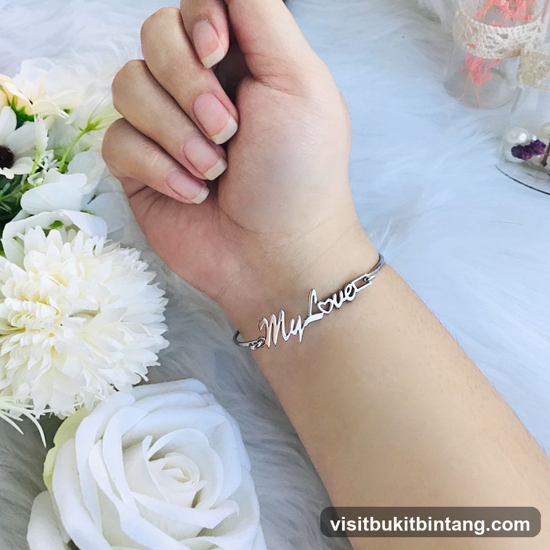 Hand with Bracelet and White Flowers