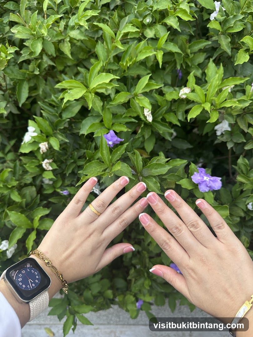 Hands with French Manicure and Jewelry