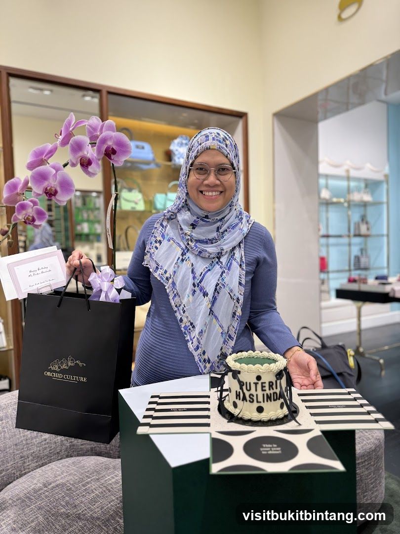Woman with a cake and orchid plant