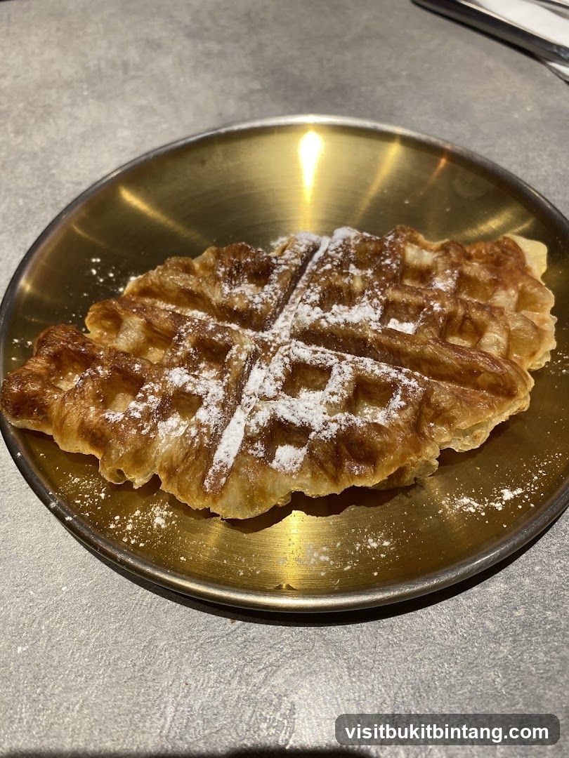 Croissant Waffle with Powdered Sugar