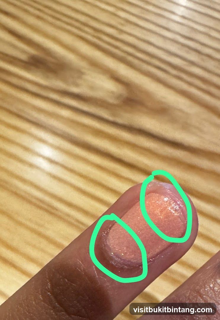 Close-up of a finger with makeup