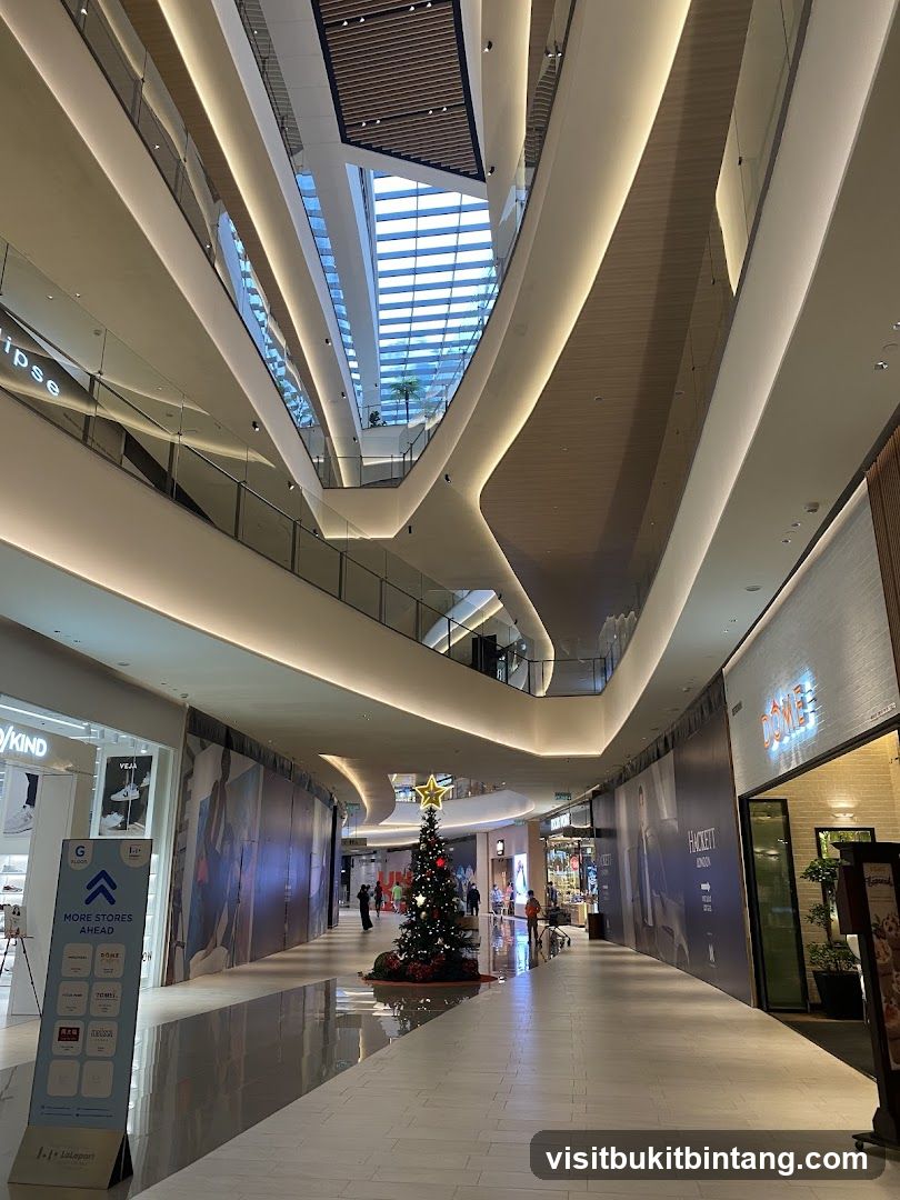 Modern Shopping Mall Interior with Christmas Tree