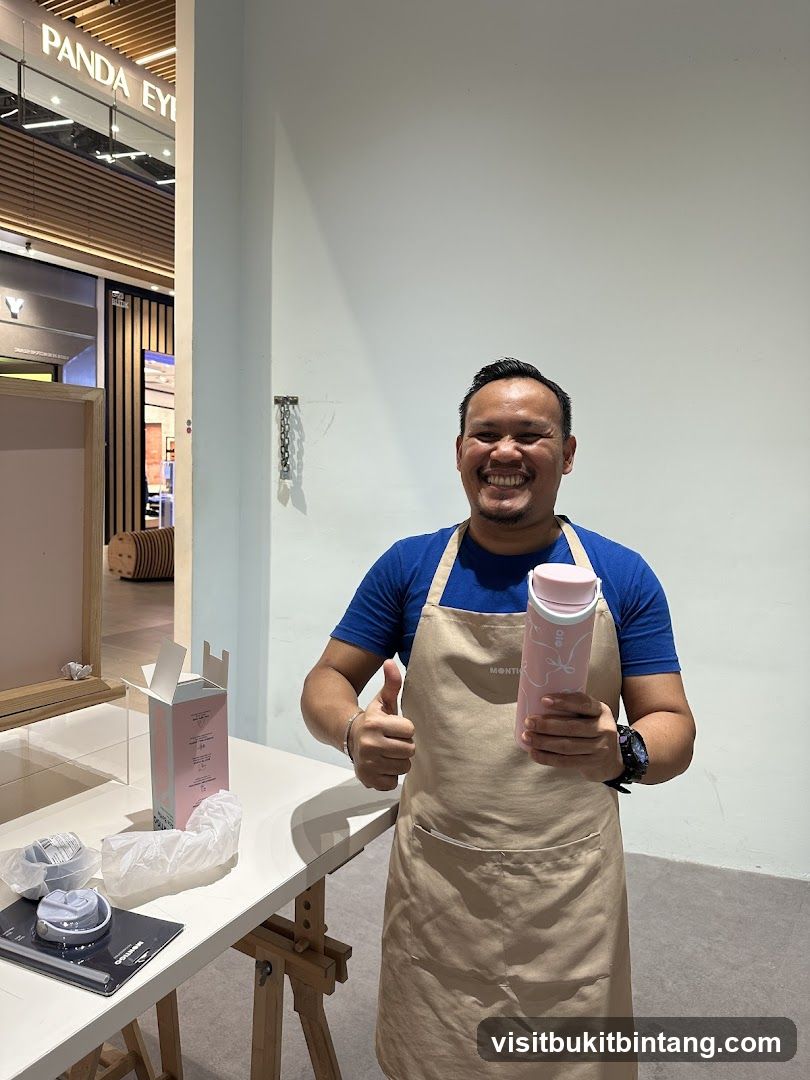Man holding a pink water bottle