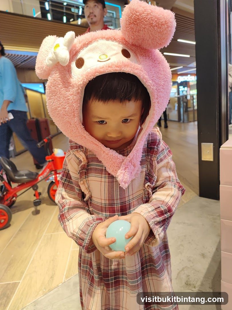 Child in a Pink Bunny Hat