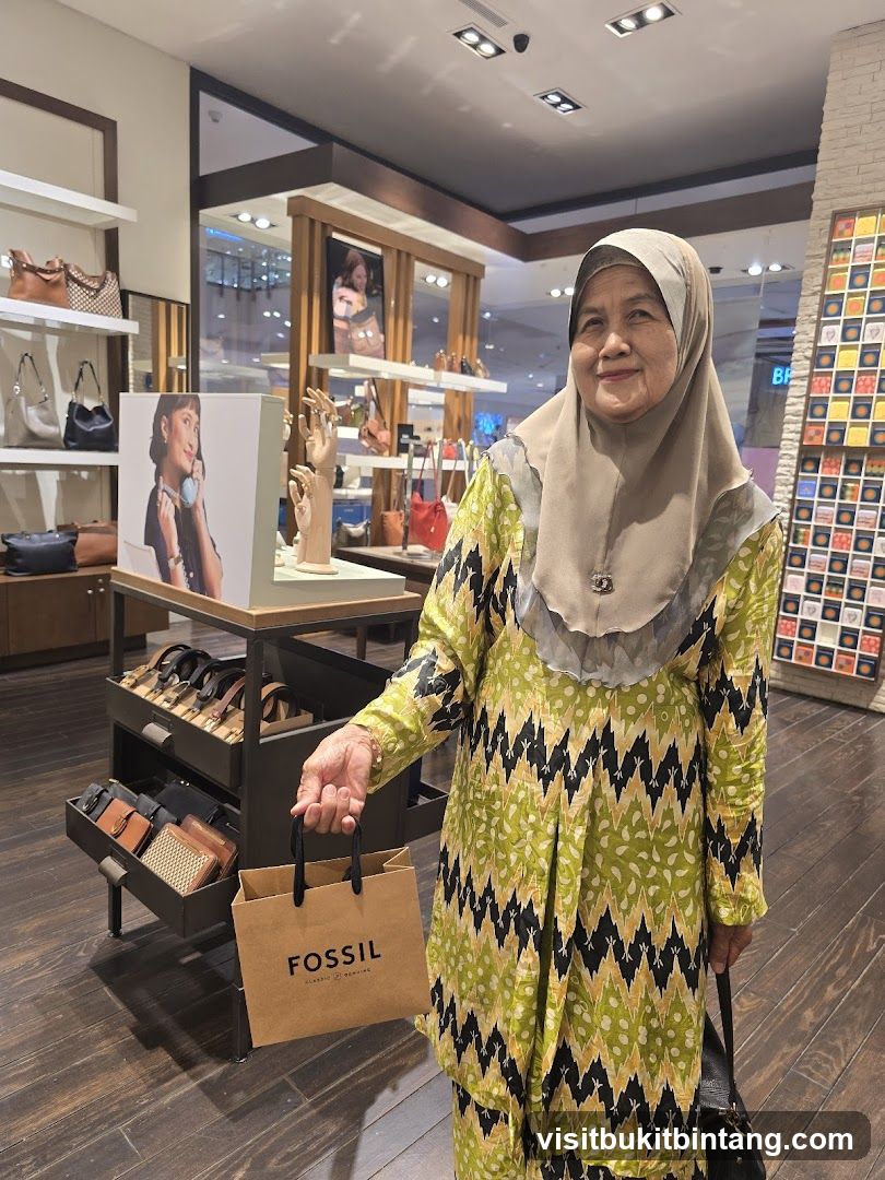 Woman holding a Fossil shopping bag in a store