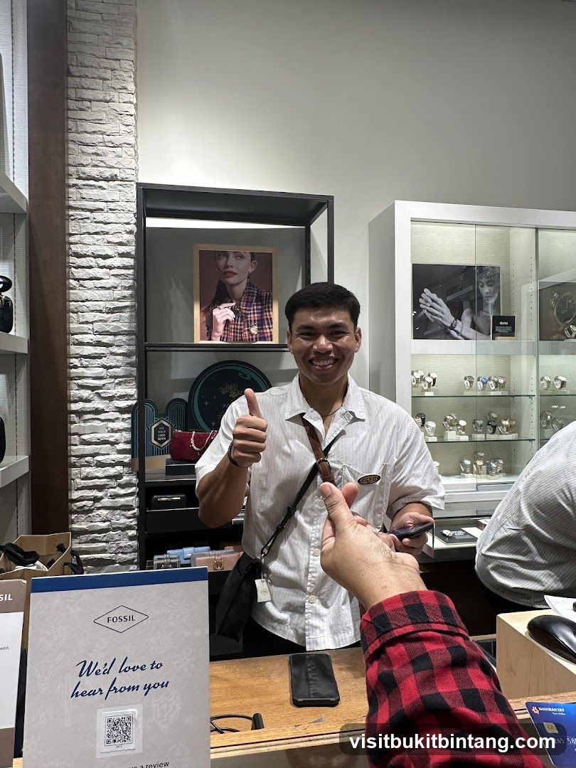Fossil Store Employee Giving Thumbs Up