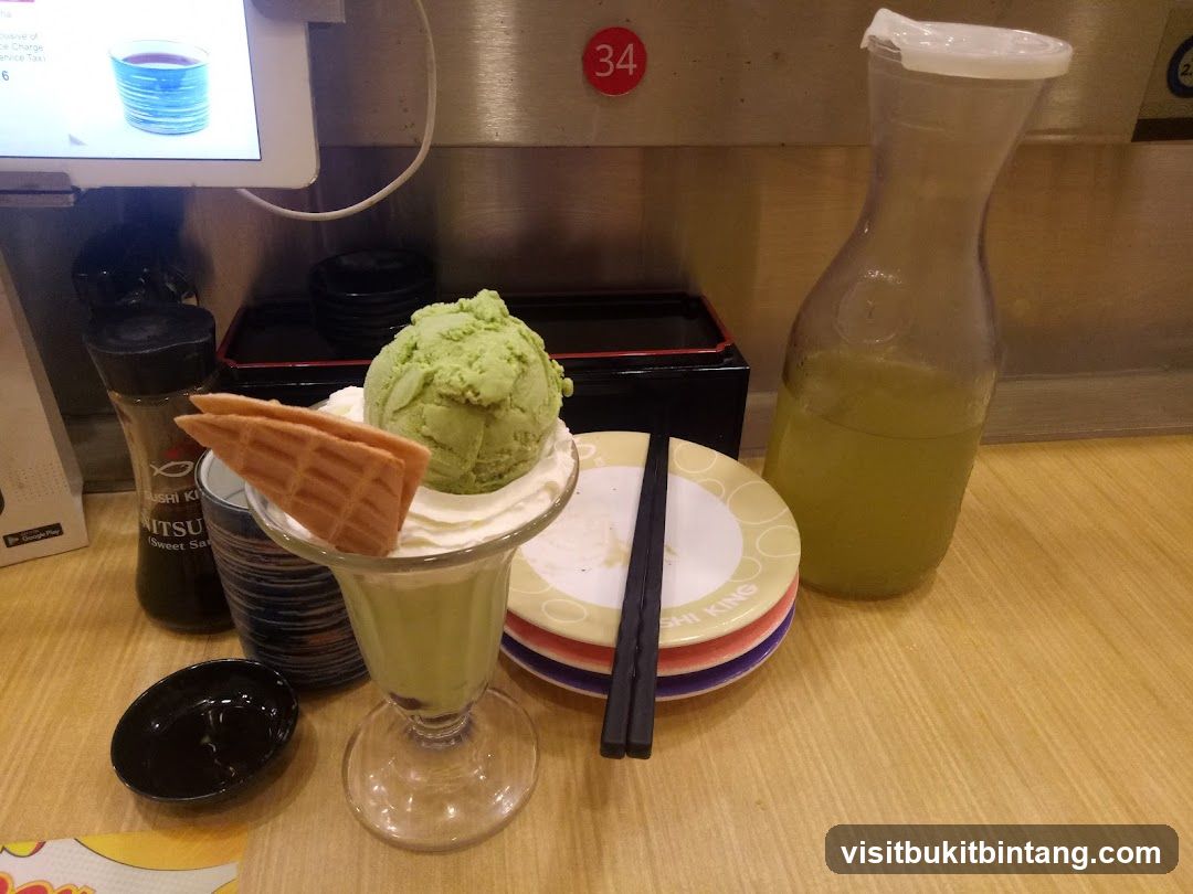Matcha dessert with waffle cookies and green tea