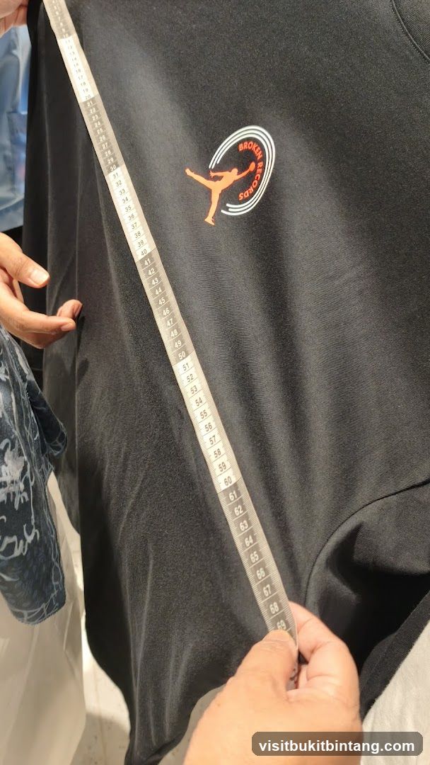 T-shirt with logo and measuring tape