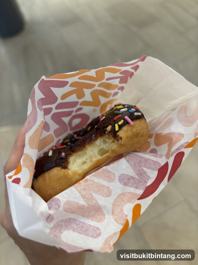 Chocolate Frosted Donut with Sprinkles