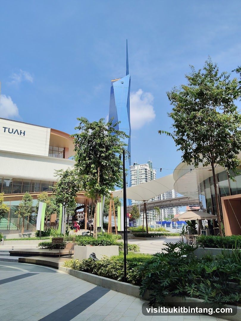 Modern Outdoor Plaza with Tall Blue Skyscraper