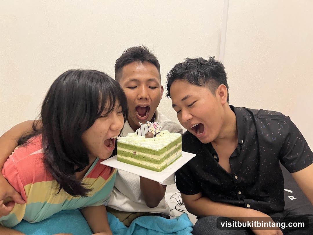 People celebrating with a cake