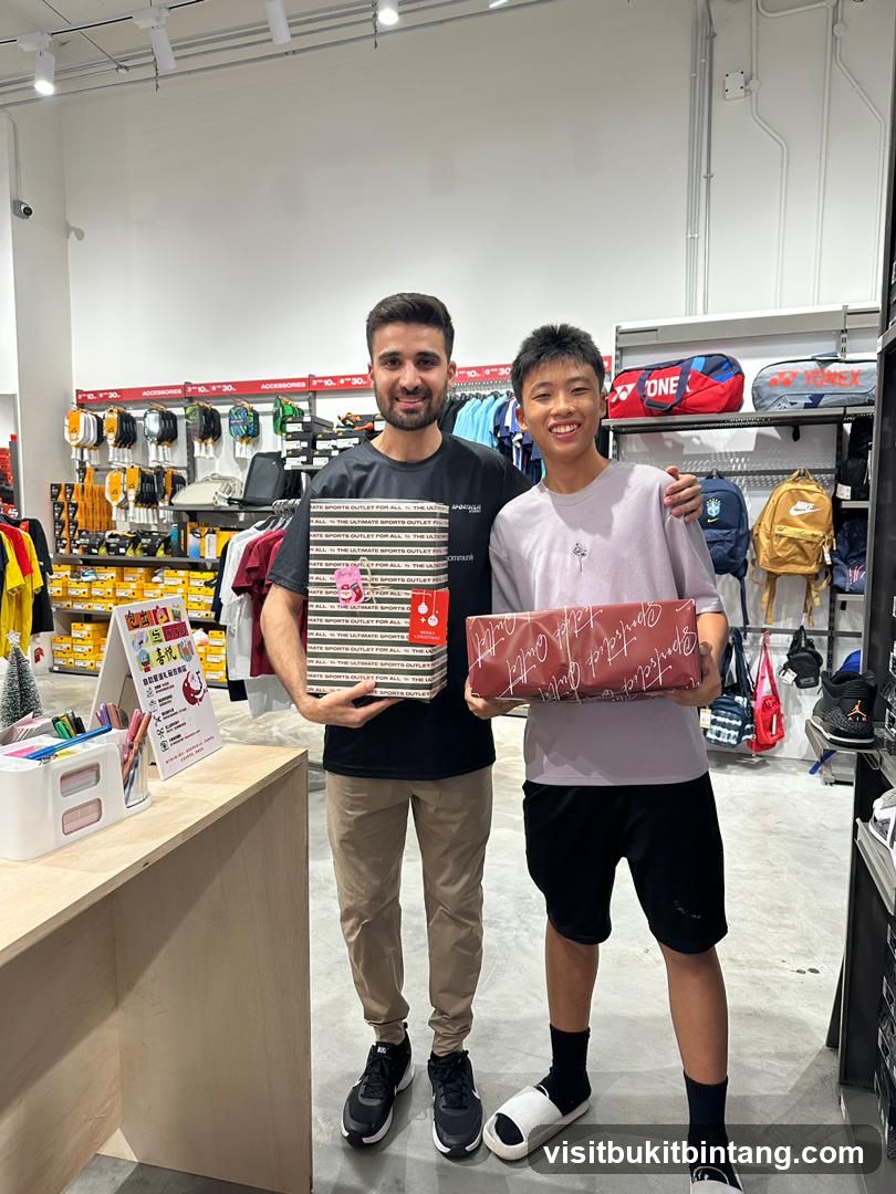 Two people holding gift boxes in a sports store