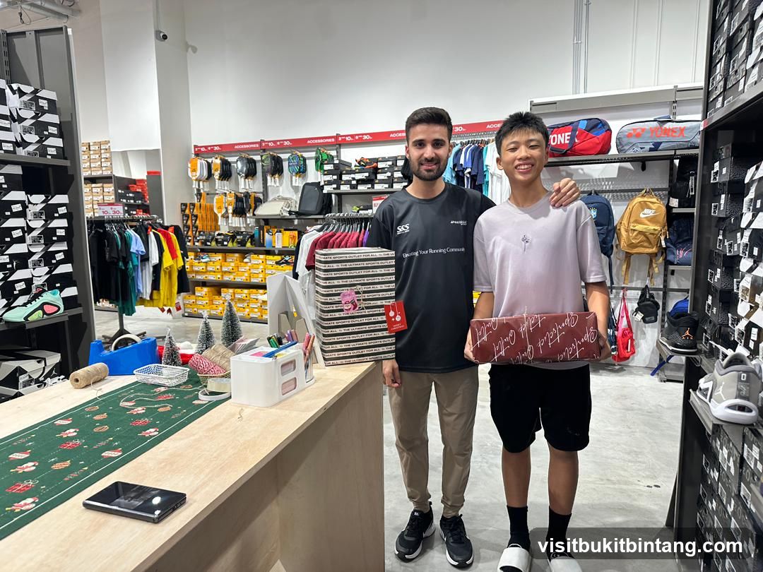 Two people holding a gift box in a sports store