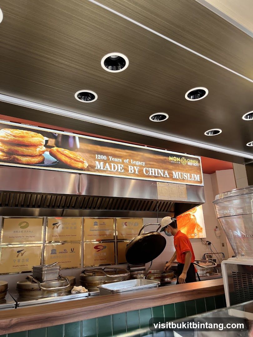 Food Stall Interior with Staff Cooking