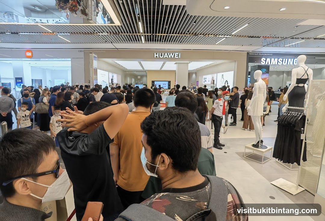 Crowd outside electronics stores
