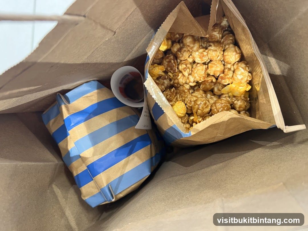 Popcorn and Wrapped Food in a Bag