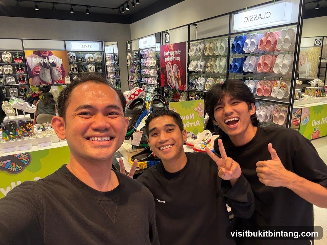 Three men smiling in a shoe store