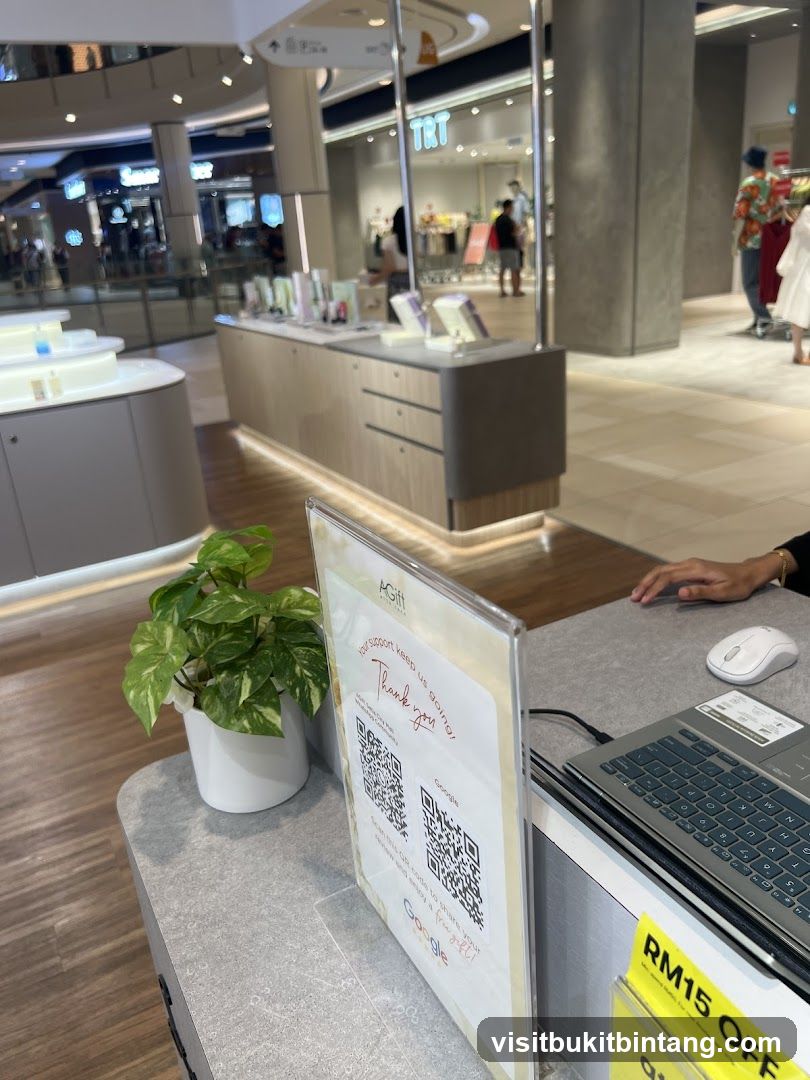 Store counter with QR codes and promotional sign