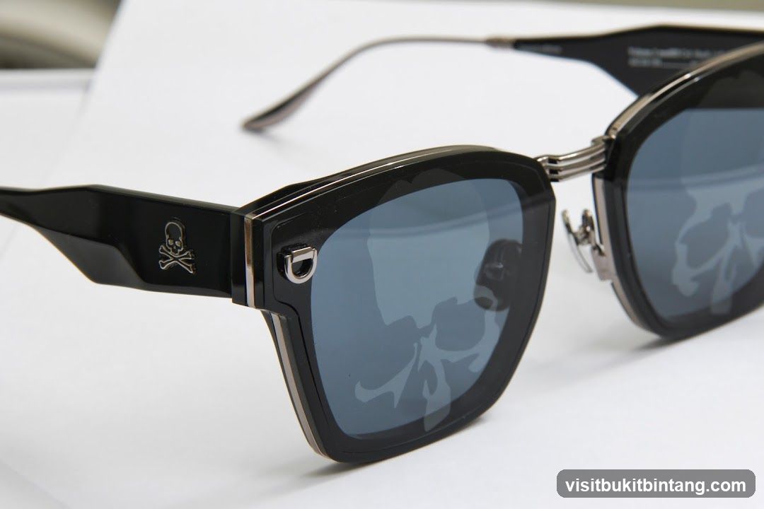 Black Sunglasses with Skull Emblem