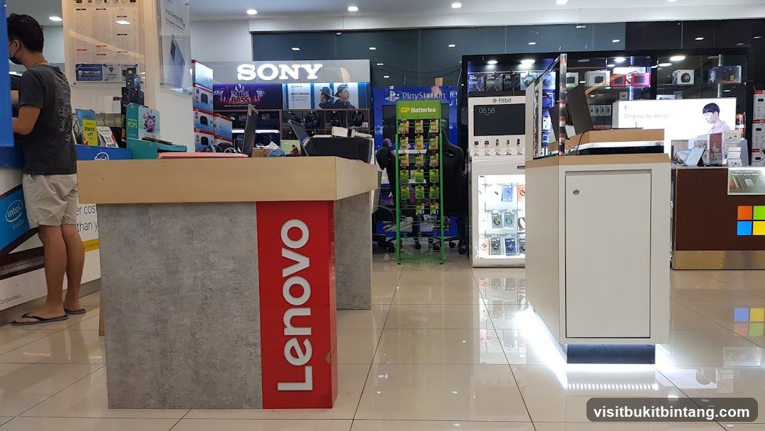 Electronics store interior with branded displays