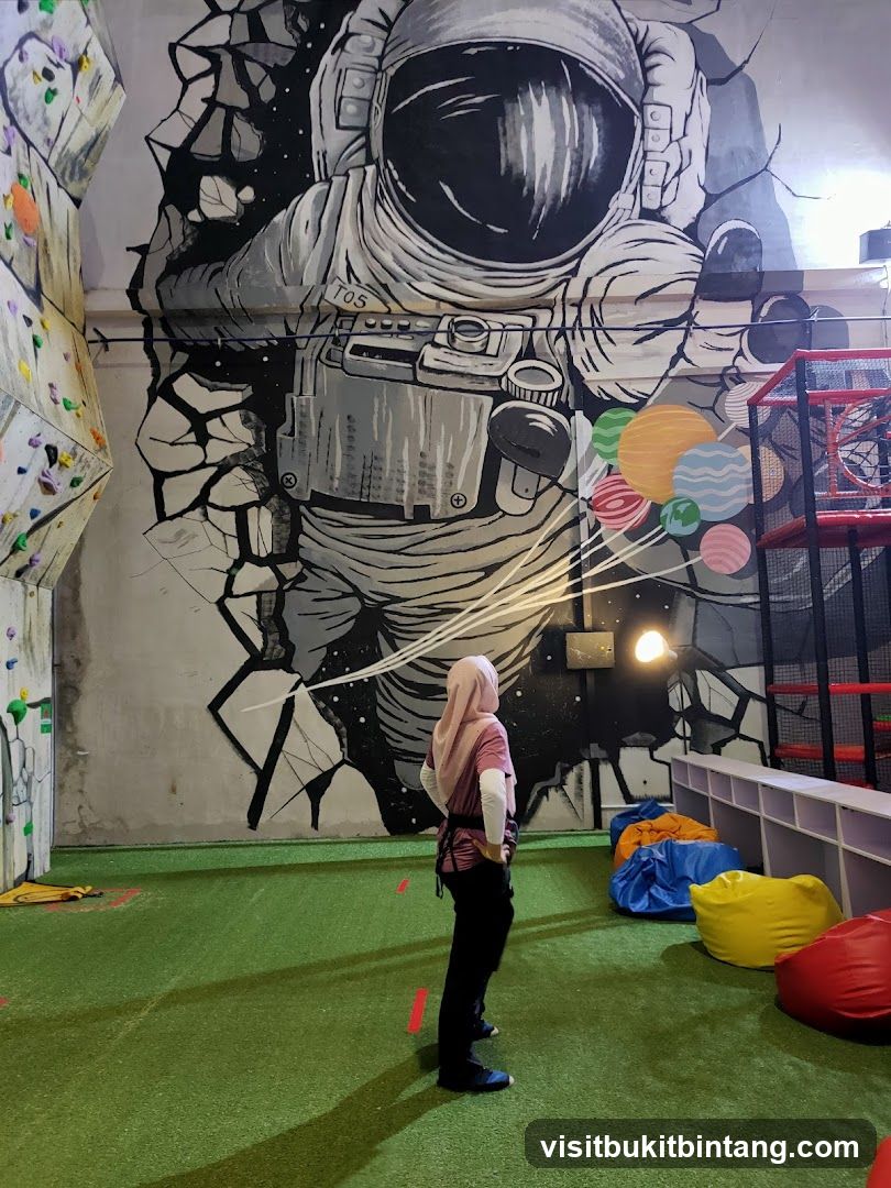 Indoor Climbing Gym with Astronaut Mural