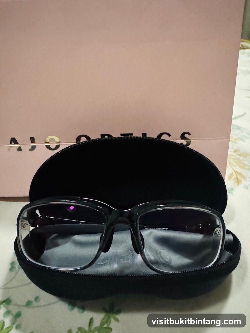 Eyeglasses in case with branded box