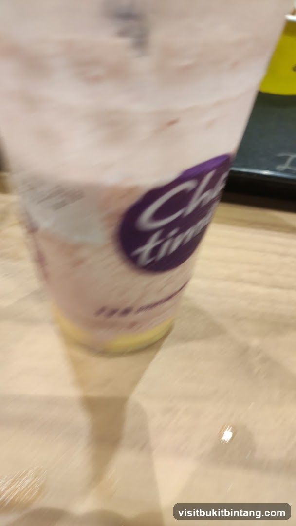 Drink in a cup with logo