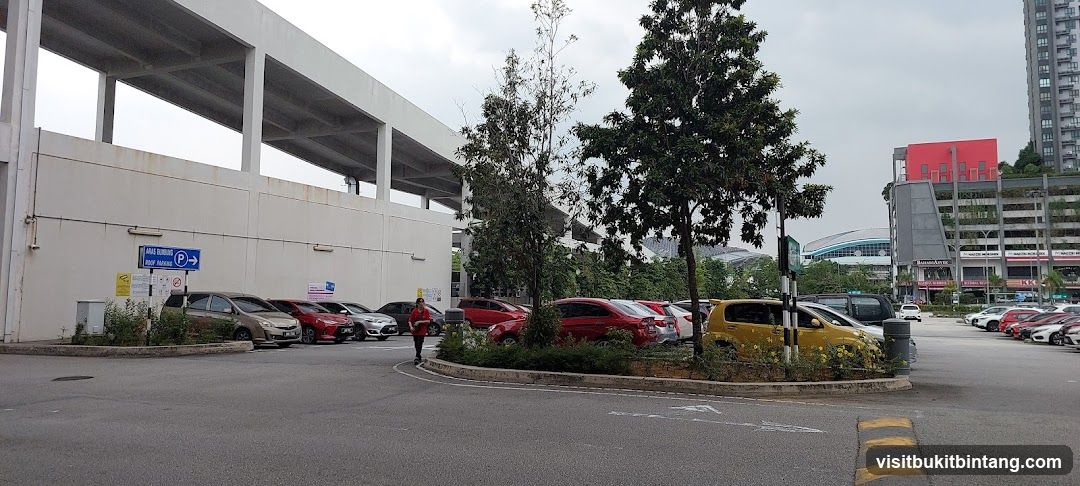 Parking Lot with Buildings and Cars